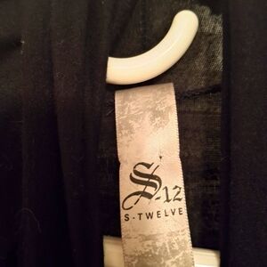 From The BUCKEL S-Twelve Elegant Black Garment